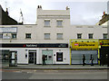 A bank between a pawnbroker and a solicitor, Denmark Hill, Camberwell