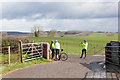 ST6640 : Cyclists at entrance to Small Down Farm by Peter Facey
