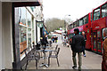 Coffee shops and red buses