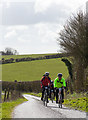 ST6640 : Cyclists riding up Small Down Lane by Peter Facey