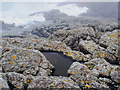HU6770 : Rock walk towards the sea by Julian Paren