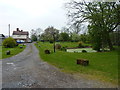 Duckpond and buildings at Sundorne Farm