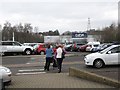 Crossing the car park in the direction of the Sprucefield