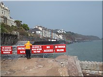 SX9676 : Man at work on Dawlish sea-wall by David Smith