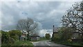 Bus stop and stone buildings, Upwaltham