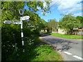 Signpost at road junction in Lasham