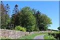 Minor road & boundary wall at Neilshill House