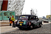 J3575 : Belfast - Titanic Quarter - Black Taxi covered with Messages by Suzanne Mischyshyn