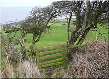 NZ9602 : Gate or fence off the old railway track by Humphrey Bolton