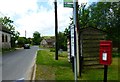 Post box and bus stop in Langrish