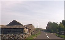 SD7891 : A684 at entrance to lane for station by John Firth