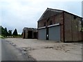 Farm buildings and propane tanks near to The Wash