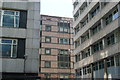 View of the apartments above the parade of shops on Moorfields from the square in front of CityPoint