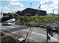 Barriers rising at Coedcae Lane level crossing, Pontyclun