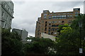 View of an apartment block above Earls Court station and the Holiday Inn on Cromwell Road from Lexham Gardens