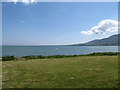 Grass strip between the service road and the foreshore at Killowen