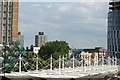 TQ3884 : View over Stratford from the top of the steps leading from the footbridge over the station down to street level by Robert Lamb
