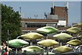 View of the Stratford Centre multi-storey car park and the Shoal sculpture from the top of the steps leading from the footbridge