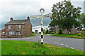 NY4438 : Road junction with renovated signpost, Hutton End by Rose and Trev Clough