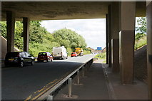 TA0222 : Far Ings Road goes under the Humber Bridge by Ian S