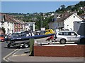 A July Saturday visitor towing a boat, Tesco petrol filling station, Teignmouth