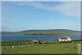 Millhouse by the Burn of Millhouse with Eynhallow and Rousay in the distance