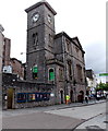 Entrances to public toilets beneath a clock tower in Torquay