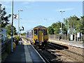 A Carlisle bound train departing from Seaton Carew