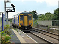 A class 156 train leaving Seaton Carew for Newcastle