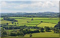 SS8726 : Farmland in Somerset near East Anstey, Devon by Edmund Shaw