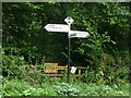 Leigh: signpost at The Holm Bushes