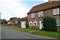 Unusual windows in a cottage in Bagby