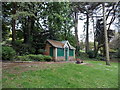 Bench and park building in St James Gardens, Swansea