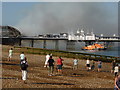 TV6198 : RNLI Lifeboats fire fighting at Eastbourne Pier by PAUL FARMER