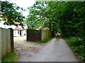 Footpath passes dwelling on Cobbetthill Common