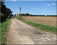 TF9038 : Farm track off the B1105 road by Evelyn Simak