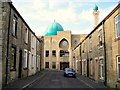 New mosque, old houses