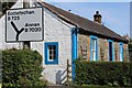 Road sign & cottage, Dalton