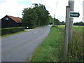 The B1120 and footpath sign