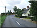 Cottage and bend in road