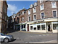 Approaching the junction of James Square and Hill Street