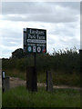 TM3188 : Earsham Park Farm sign by Geographer