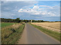TM4151 : Road through arable land from Five Cross Ways to Sudbourne Church by Roger Jones