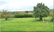 SP1268 : Farmland between a garden and a railway by Christine Johnstone