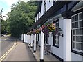 Hanging baskets at the Burford Bridge Hotel