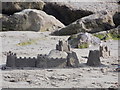 SY3391 : Lyme Regis: close-up of a sandcastle by Chris Downer