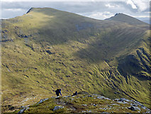 NH1671 : Two hill walkers descending the SE ridge of Sgurr Breac by Julian Paren
