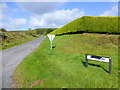 Vandalised road sign, Faccary