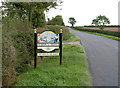 SK7785 : Sturton le Steeple village sign by Alan Murray-Rust