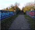 Graffiti covered former railway bridge